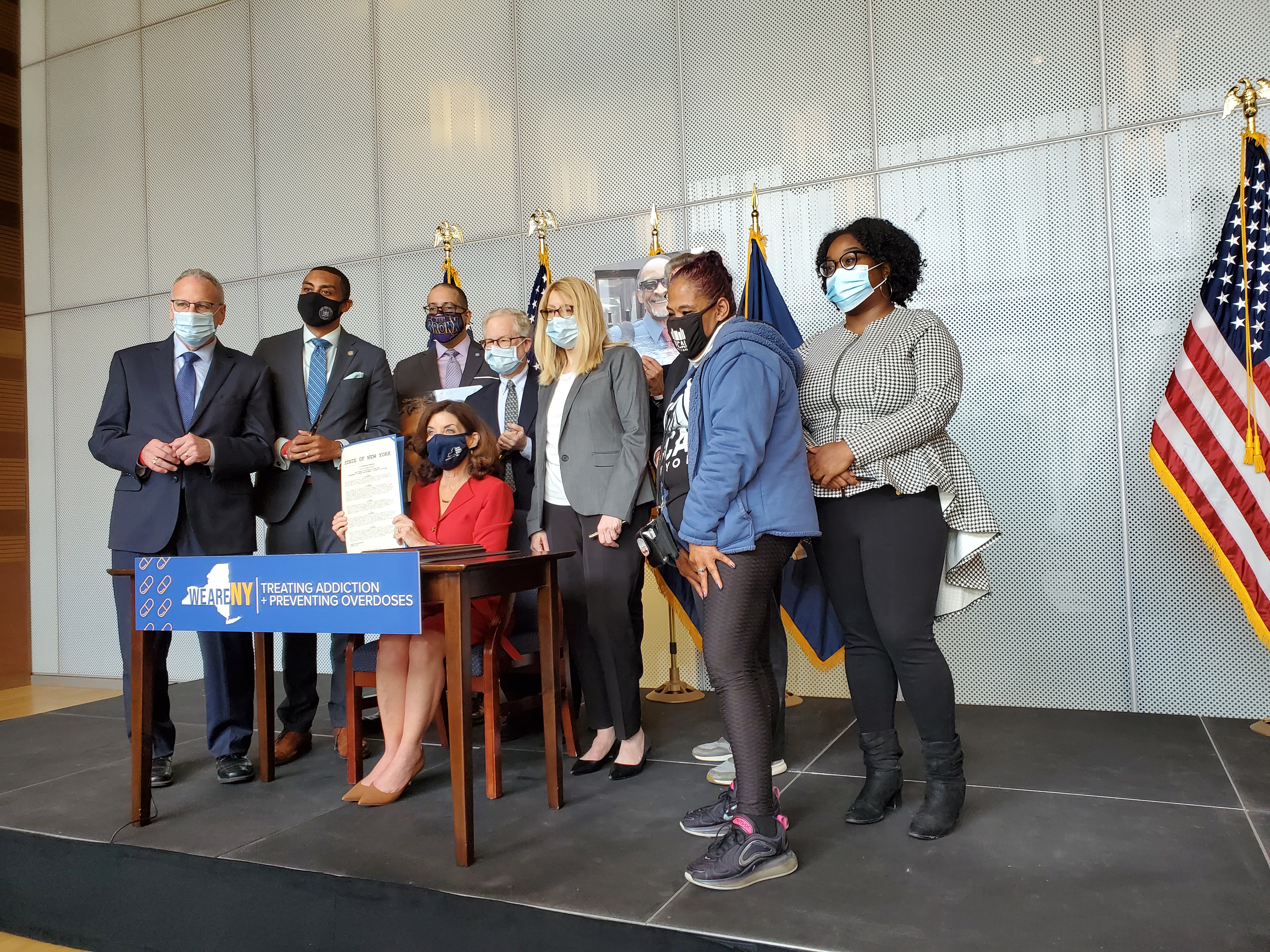 Bill signing ceremony with Governor Hochul and state legislators at John Jay College