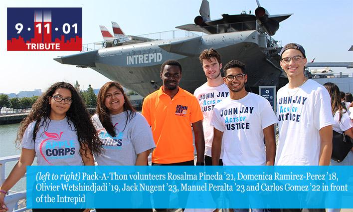 (left to right) Pack-A-Thon volunteers Rosalma Pineda ’21, Domenica Ramirez-Perez ’18, Olivier Wetshindjadi ’19, Jack Nugent ’23, Manuel Peralta ’23 and Carlos Gomez ’22 in front of the Intrepid