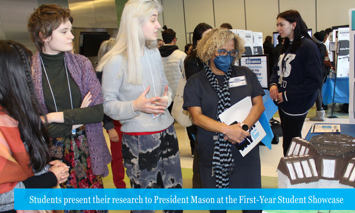 Students and President Karol Mason at the 2022 First0year Student Showcase