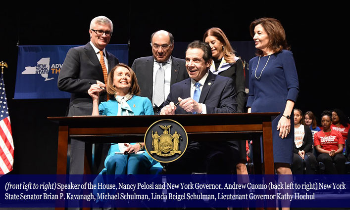 Speaker of the House, Nancy Pelosi and New York Governor, Andrew Cuomo (back left to right) New York State Senator Brian P. Kavanagh, Michael Schulman, Linda Beigel Schulman, Lieutenant Governor Kathy Hochul