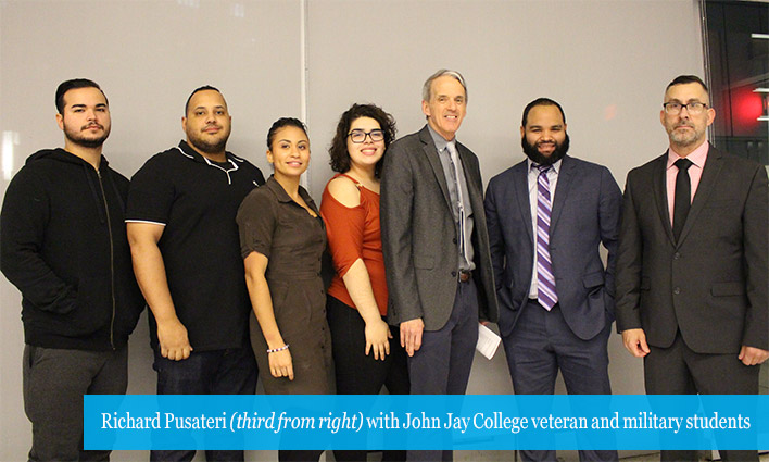 Richard Pusateri (third from right) with John Jay College veteran and military students