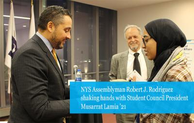 NYS Assemblyman Robert J. Rodriguez shaking hands with Student Council President Musarrat Lamia ’21